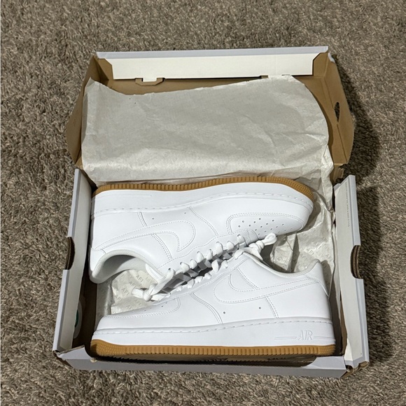 Nike Men's White and Tan Air Force ones (Brand Knew) goes for 115